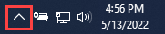 The up-arrow icon in the Windows task bar. Select the arrow to open a menu of icons.