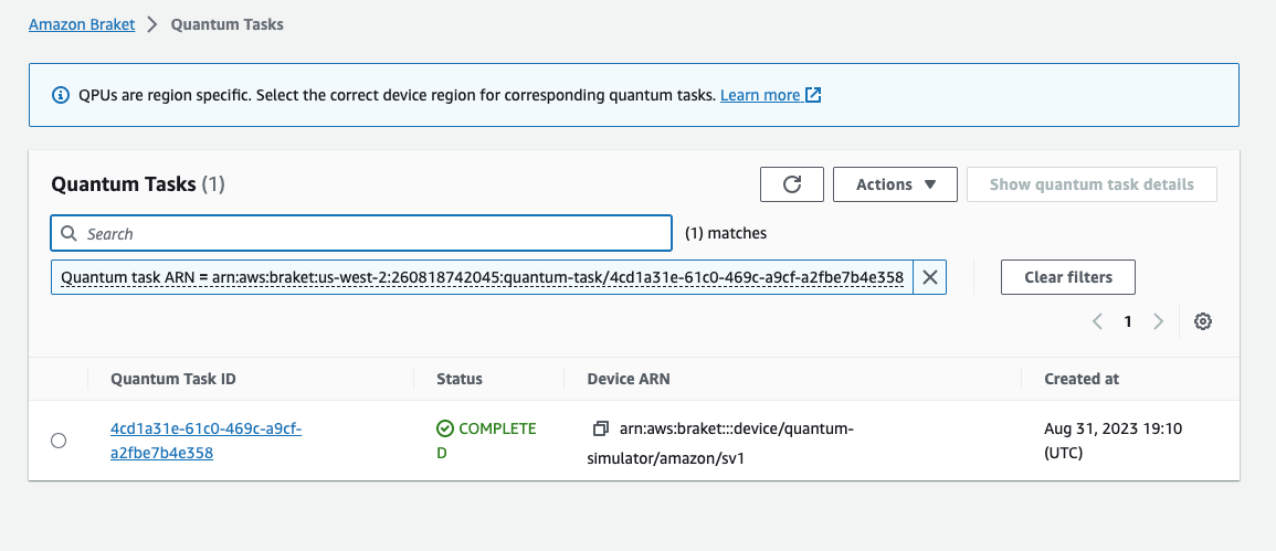 Amazon Braket Quantum Tasks console showing a completed quantum task with its task ID, status as completed, device ARN for the quantum simulator, and creation time.