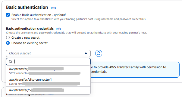 La pagina Connettori della console Transfer Family, che mostra le informazioni di autenticazione dei messaggi per il connettore. In questo caso, è selezionato Abilita l'autenticazione di base e viene scelto Scegli un segreto esistente.