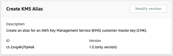 Form to create an alias for an AWS KMS customer master key, showing description and ID fields.